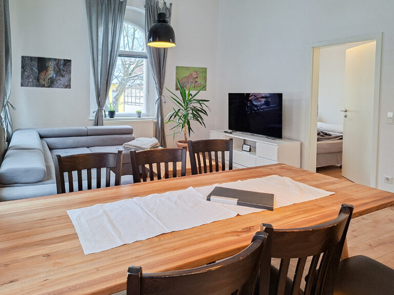 Wohnzimmer mit Essbereich - Wohnung 1