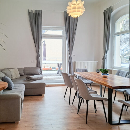 Wohnzimmer mit Esstisch - Wohnung 2