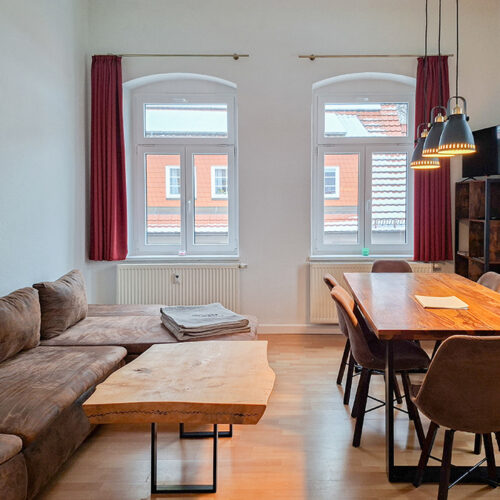 Wohnzimmer mit Esstisch - Wohnung 3