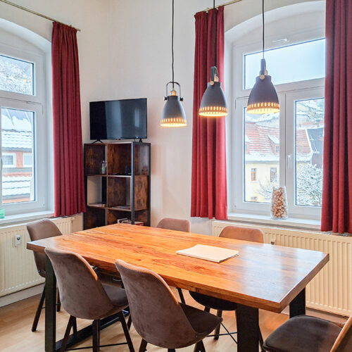 Wohnzimmer mit Esstisch - Wohnung 3