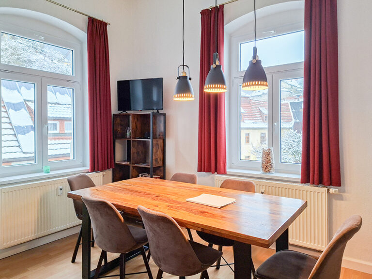 Wohnzimmer mit Esstisch - Wohnung 3