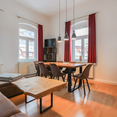 Wohnzimmer mit Esstisch - Wohnung 3