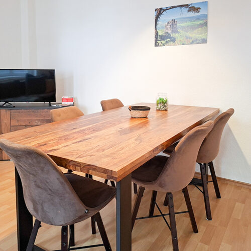 Wohnzimmer mit Esstisch - Wohnung 4