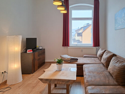 Wohnzimmer mit Couch - Wohnung 5