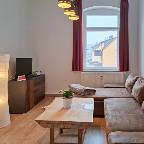 Wohnzimmer mit Couch - Wohnung 5