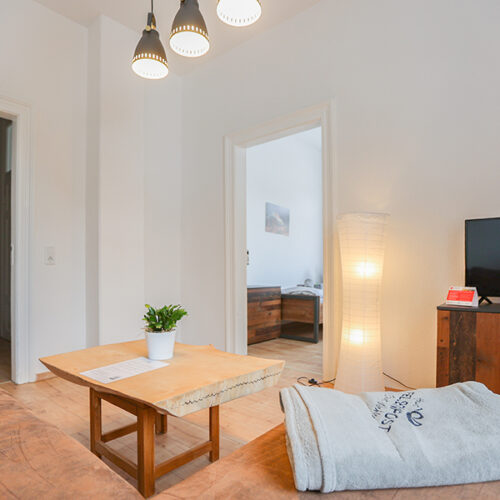 Wohnzimmer mit Couch - Wohnung 5