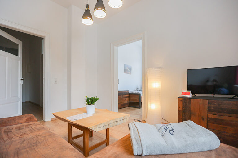 Wohnzimmer mit Couch - Wohnung 5