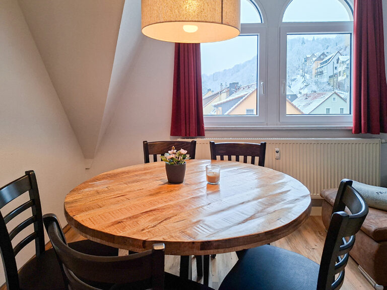 Wohnzimmer mit Esstisch - Wohnung 8