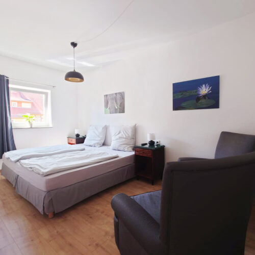 Schlafzimmer mit Doppelbett - Kutscherhaus