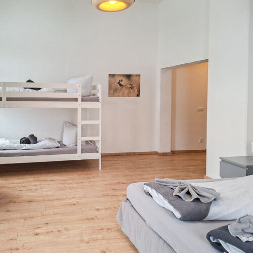Schlafzimmer mit 4 Betten - Wohnung 1