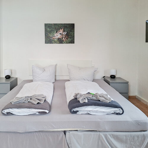 Schlafzimmer mit 4 Betten - Wohnung 1