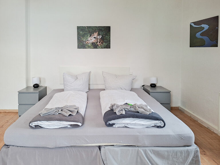 Schlafzimmer mit 4 Betten - Wohnung 1