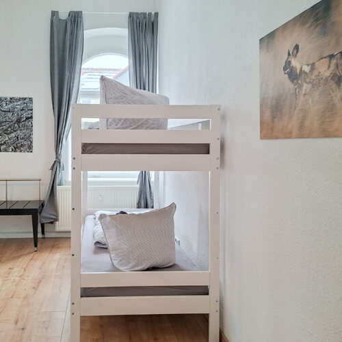 Schlafzimmer mit 4 Betten - Wohnung 1