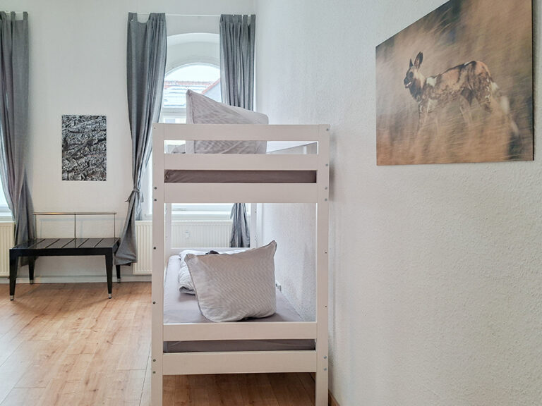 Schlafzimmer mit 4 Betten - Wohnung 1