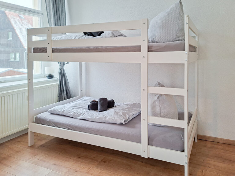 Schlafzimmer mit 4 Betten - Wohnung 1