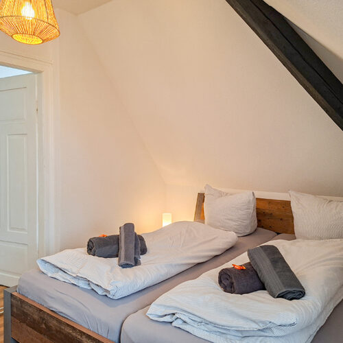 Schlafzimmer mit Doppelbett - Wohnung 6