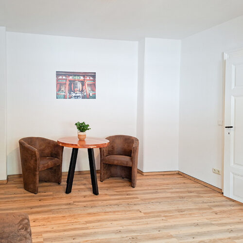 Wohnzimmer mit Esstisch - Wohnung 7