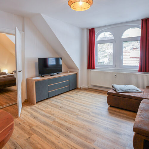 Wohnzimmer mit Esstisch - Wohnung 7