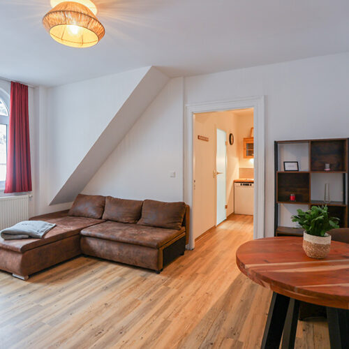 Wohnung 7 - Wohnzimmer mit Esstisch